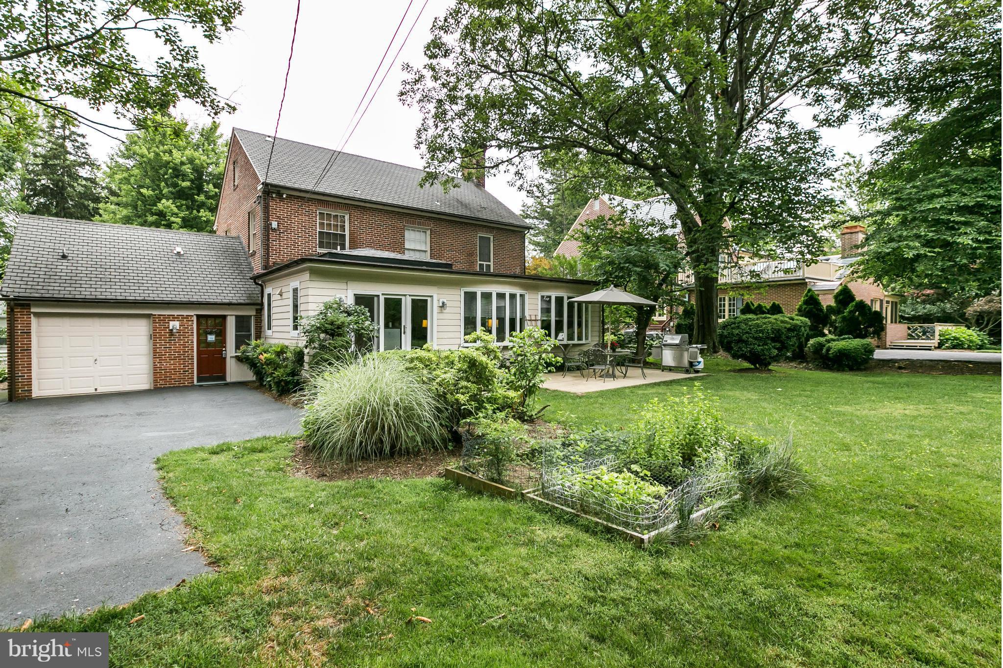 203 Midhurst Road Baltimore, MD 21212 - Photo 26 of 30 a front view of a house with garden