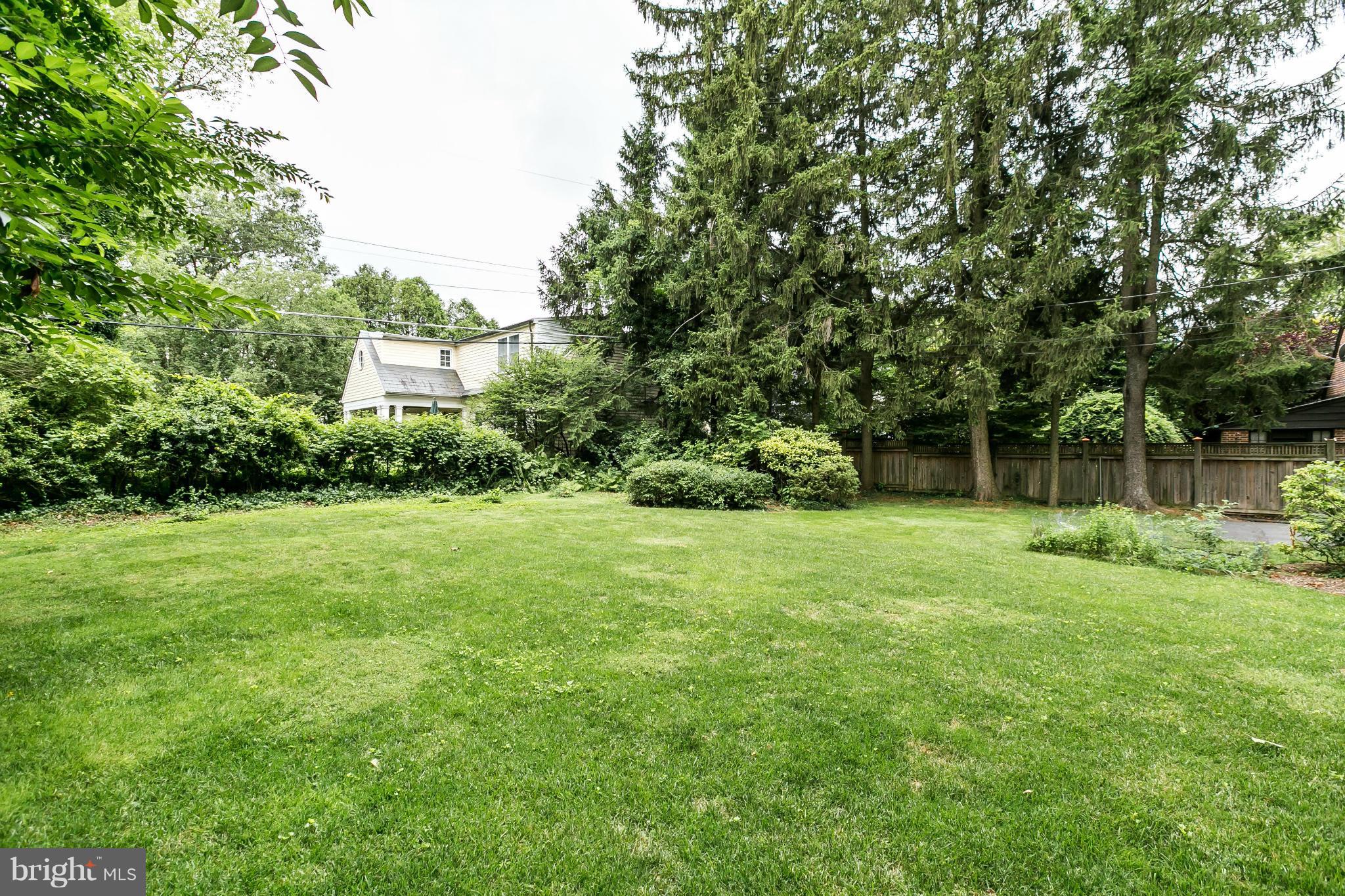203 Midhurst Road Baltimore, MD 21212 - Photo 29 of 30 a view of a backyard with a garden