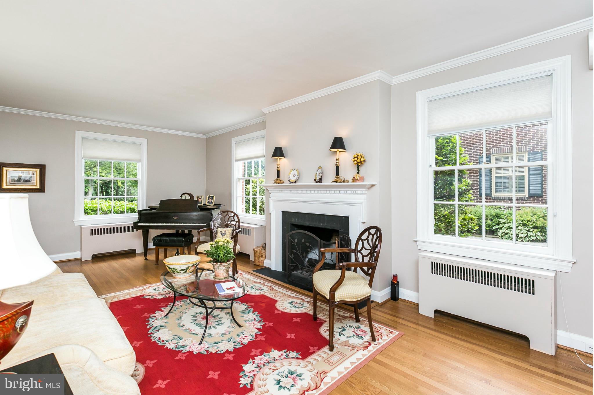 203 Midhurst Road Baltimore, MD 21212 - Photo 4 of 30 a living room with furniture and a fireplace