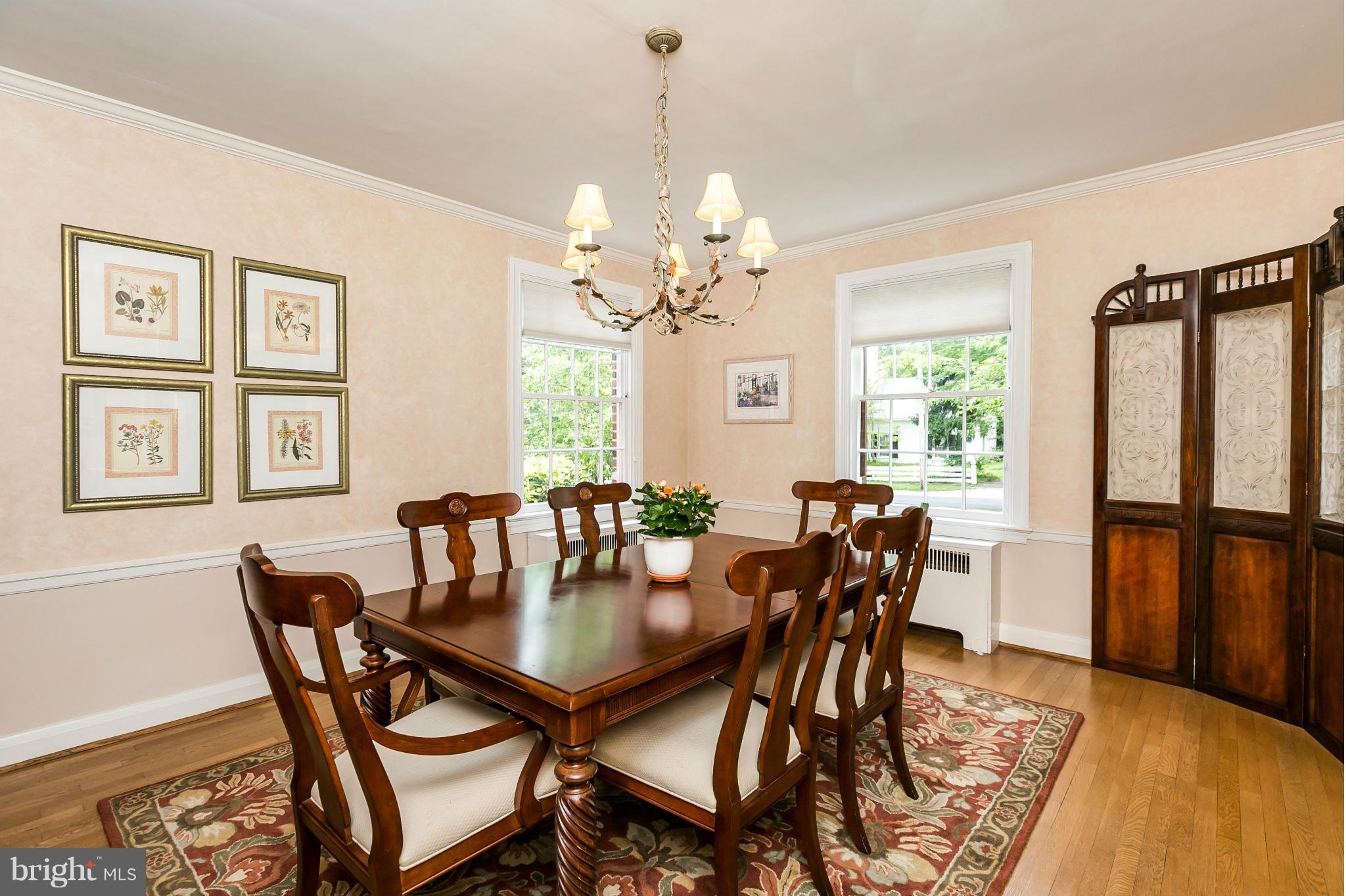 203 Midhurst Road Baltimore, MD 21212 - Photo 6 of 30 a view of a dining room with furniture window and wooden floor