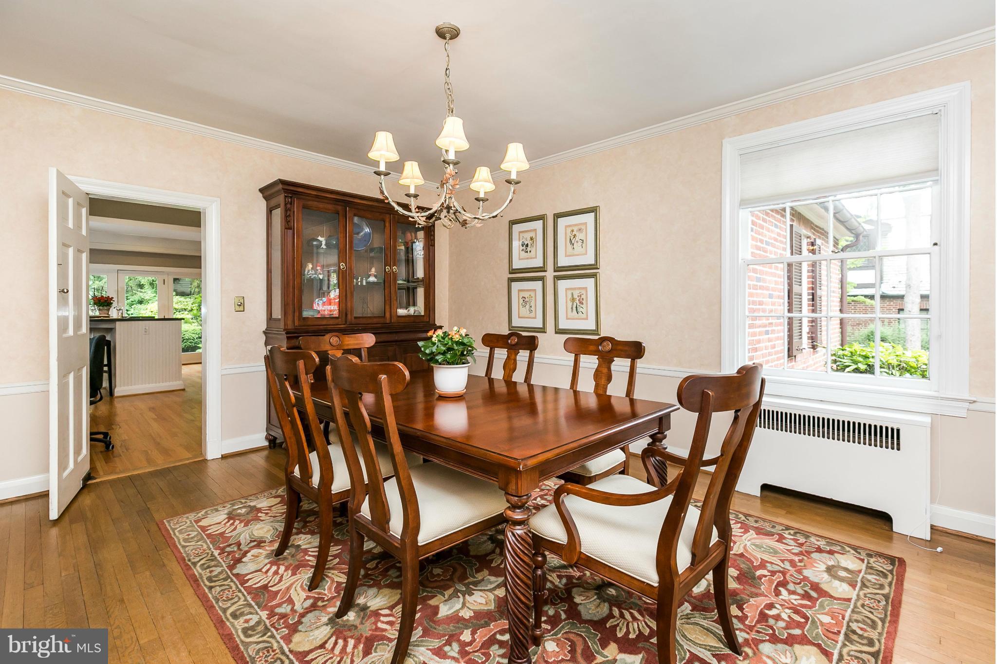 203 Midhurst Road Baltimore, MD 21212 - Photo 7 of 30 a view of a dining room with furniture window and wooden floor