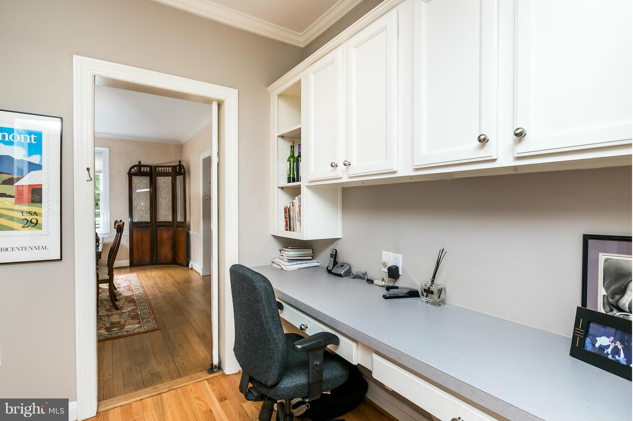 203 Midhurst Road Baltimore, MD 21212 - Photo 8 of 30 a view of a workspace with furniture
