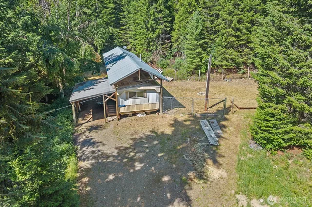 a house with a tree in front of it