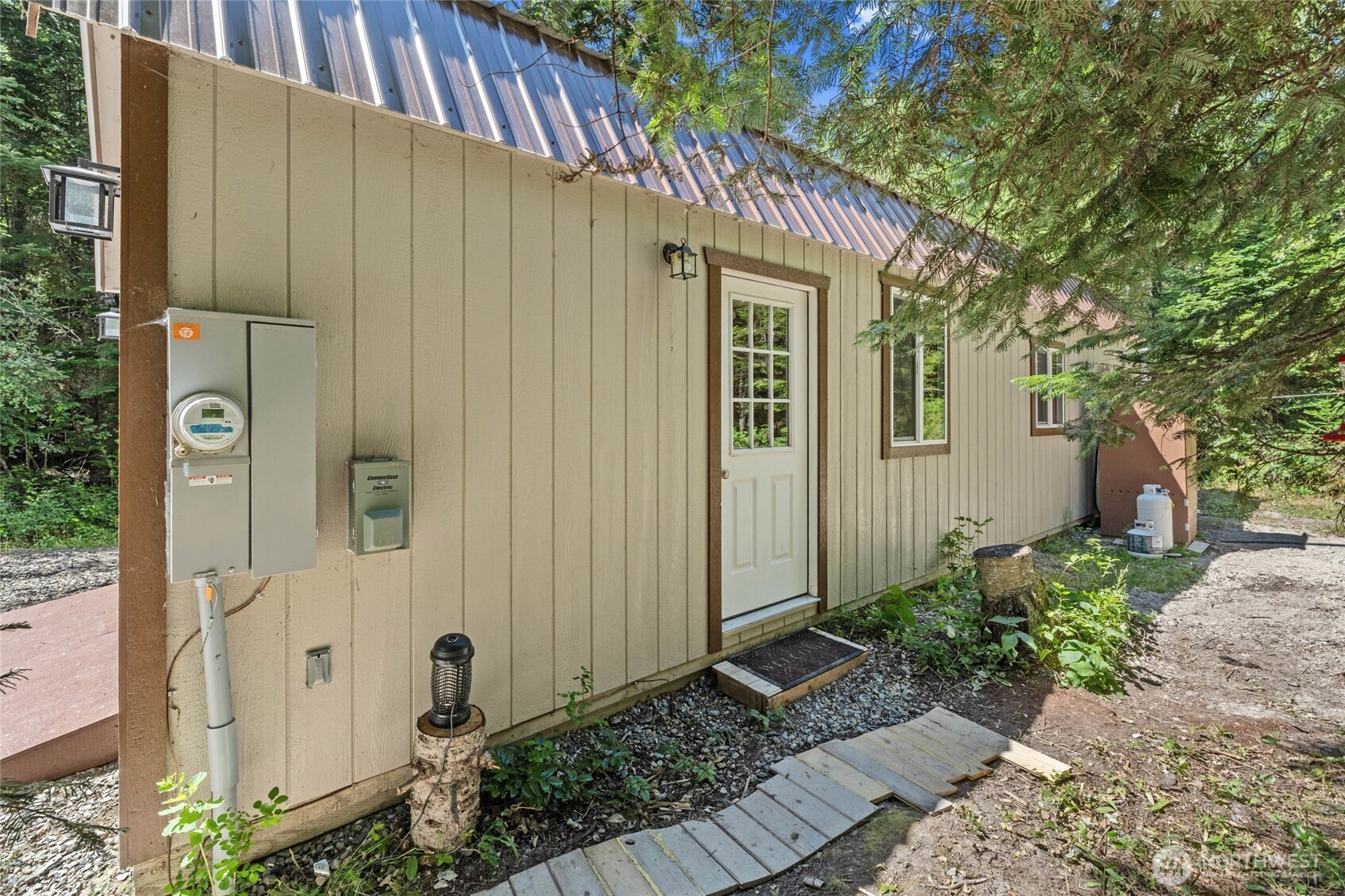 28922 LeClerc Road North Ione, WA 99139 - Photo 5 of 31 a view of a house with a backyard