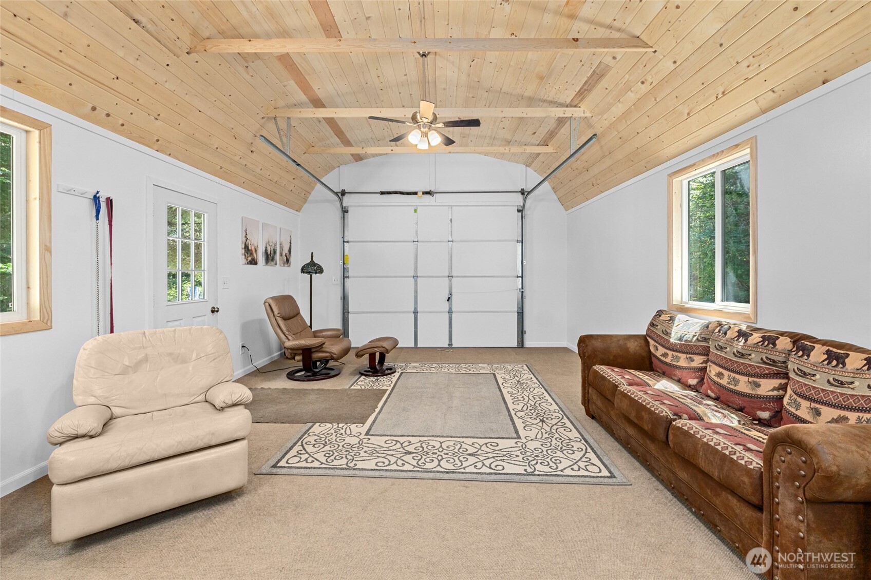 28922 LeClerc Road North Ione, WA 99139 - Photo 8 of 31 a living room with furniture and a chandelier