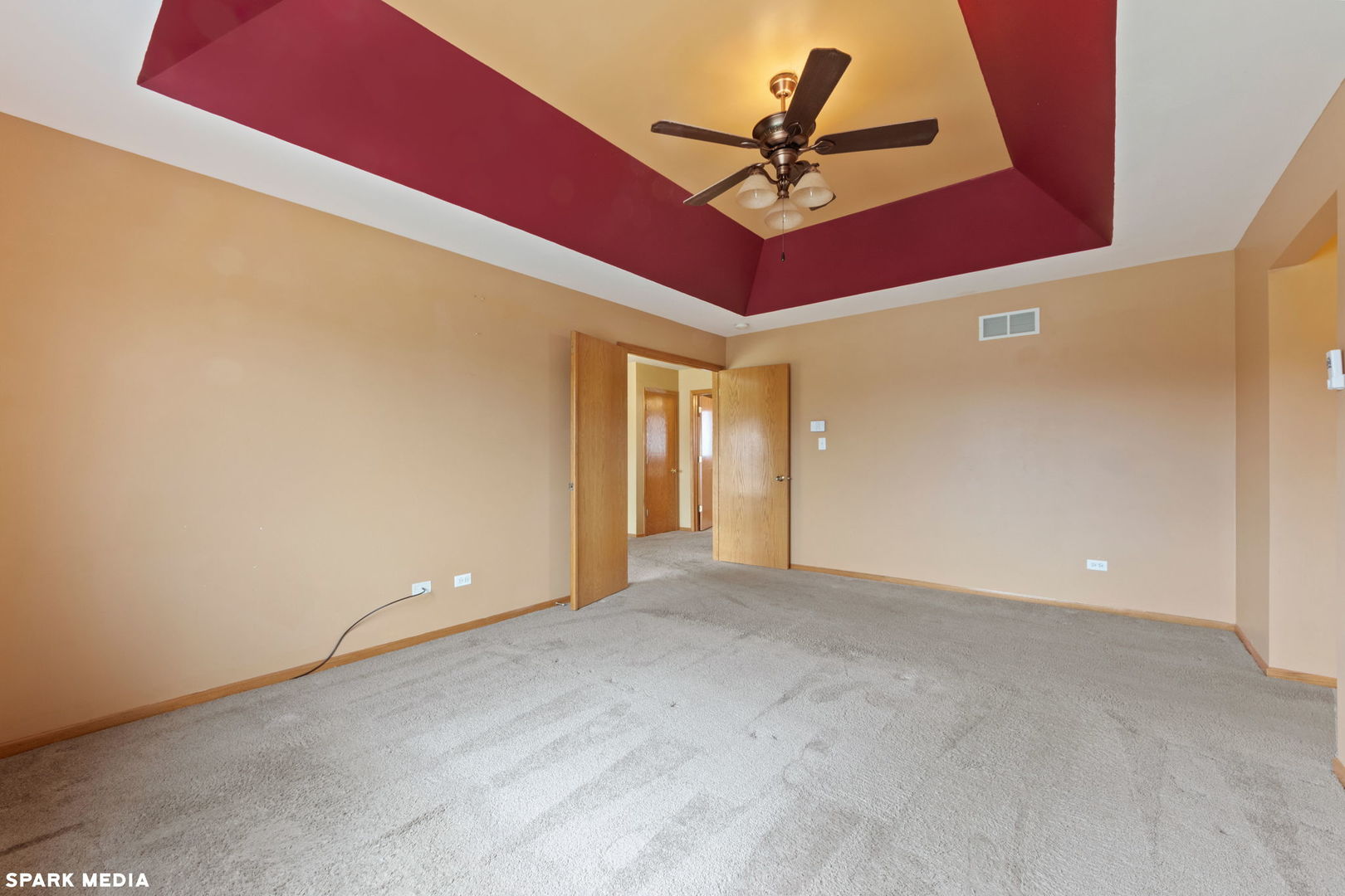 5642 Feather Creek Road Matteson, IL 60443 - Photo 16 of 36 an empty room with a ceiling fan and a window