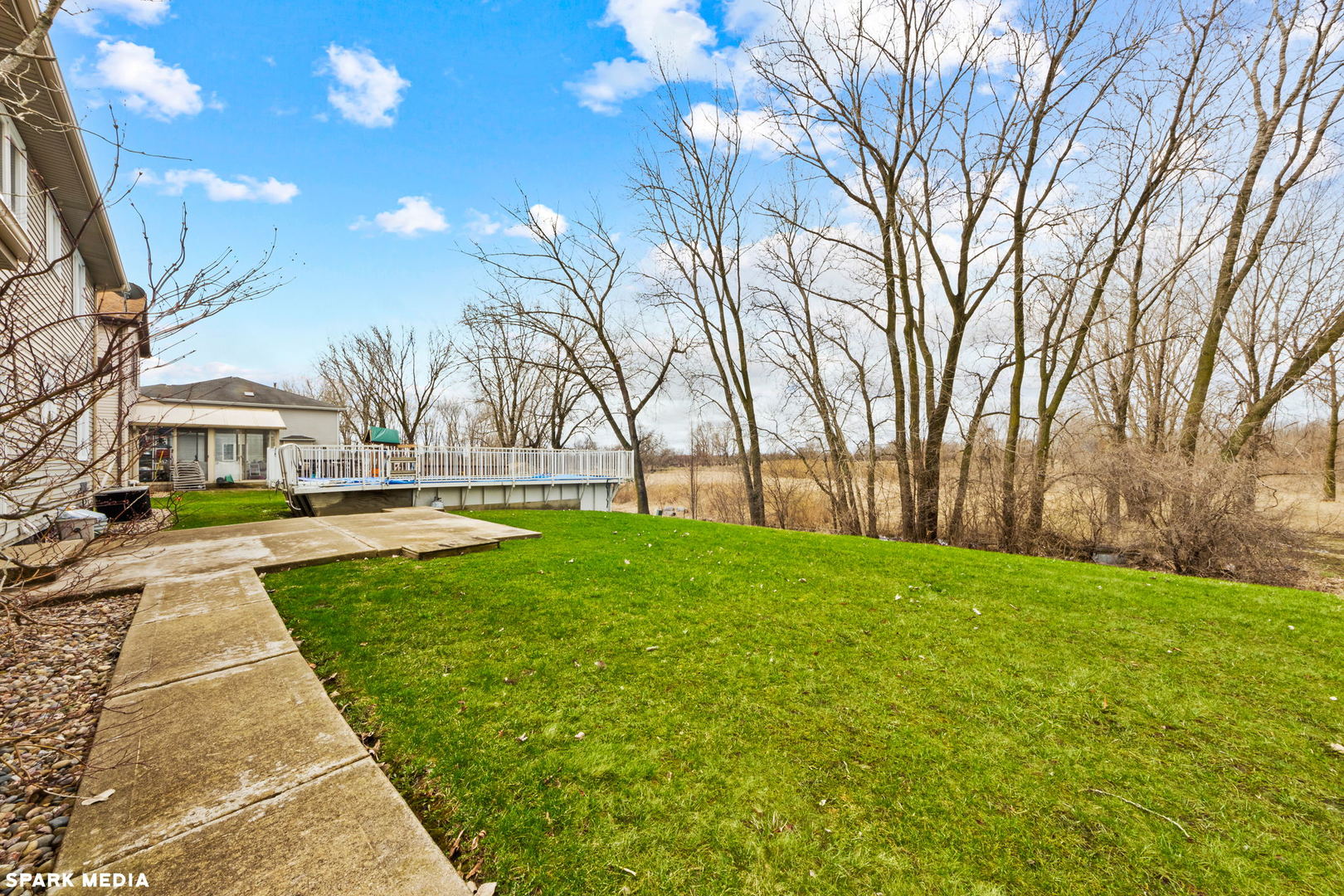 5642 Feather Creek Road Matteson, IL 60443 - Photo 31 of 36 a view of yard with swimming pool and green space