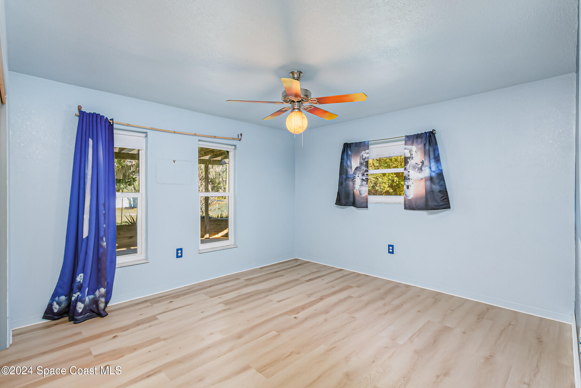 1235 Pine Island Road Merritt Island, FL 32953 - Photo 18 of 45 a view of an entryway with wooden floor