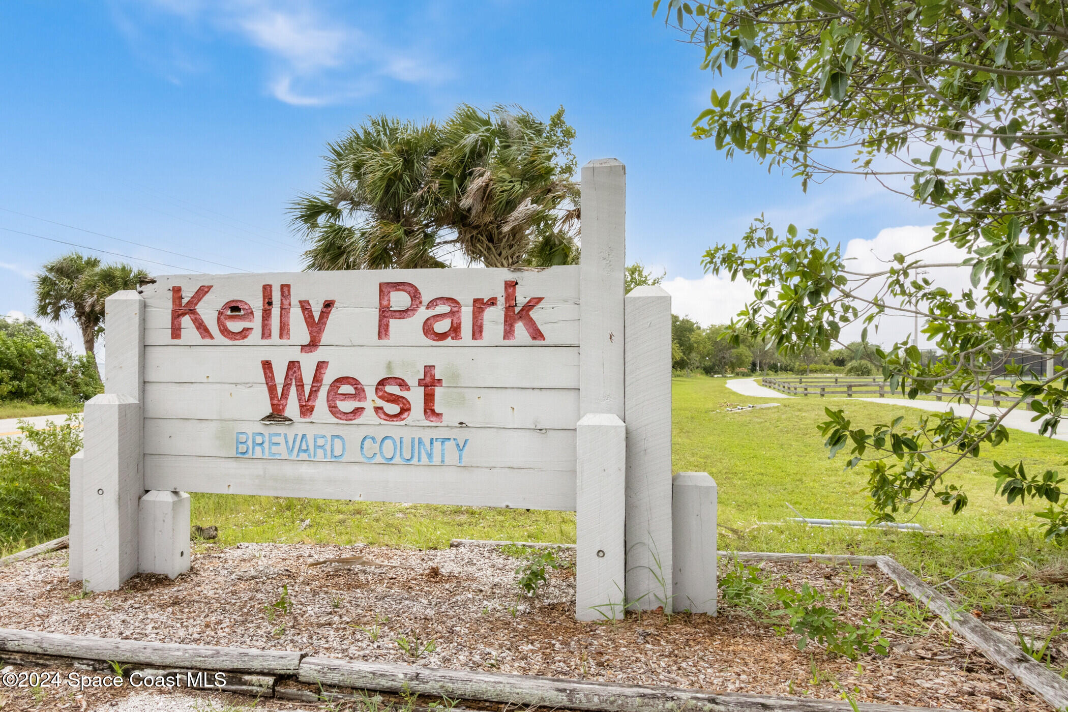 1235 Pine Island Road Merritt Island, FL 32953 - Photo 32 of 45 a sign that is on the side of the road