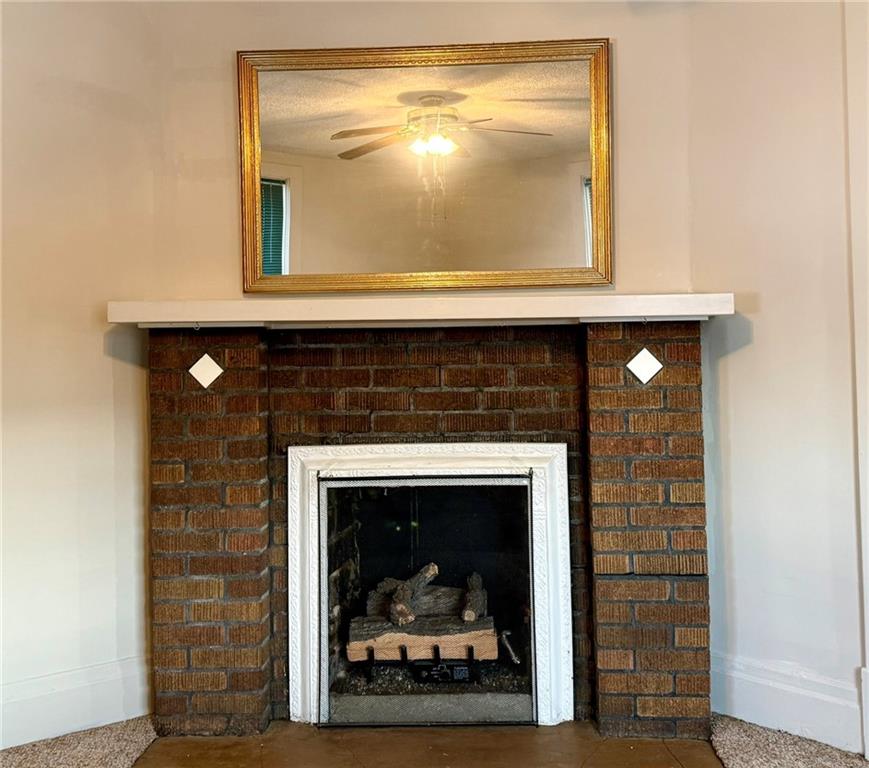 1126 Penn Avenue Vandergrift, PA 15690 - Photo 13 of 24 a living room with a fireplace