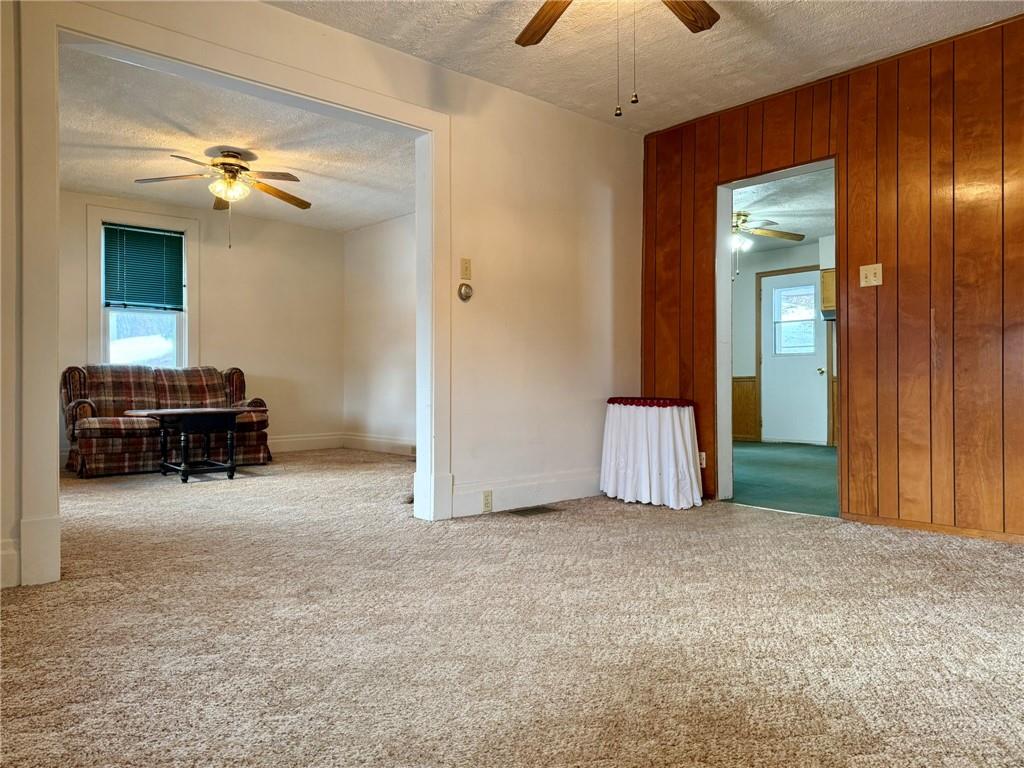 1126 Penn Avenue Vandergrift, PA 15690 - Photo 14 of 24 a view of a livingroom with a staircase