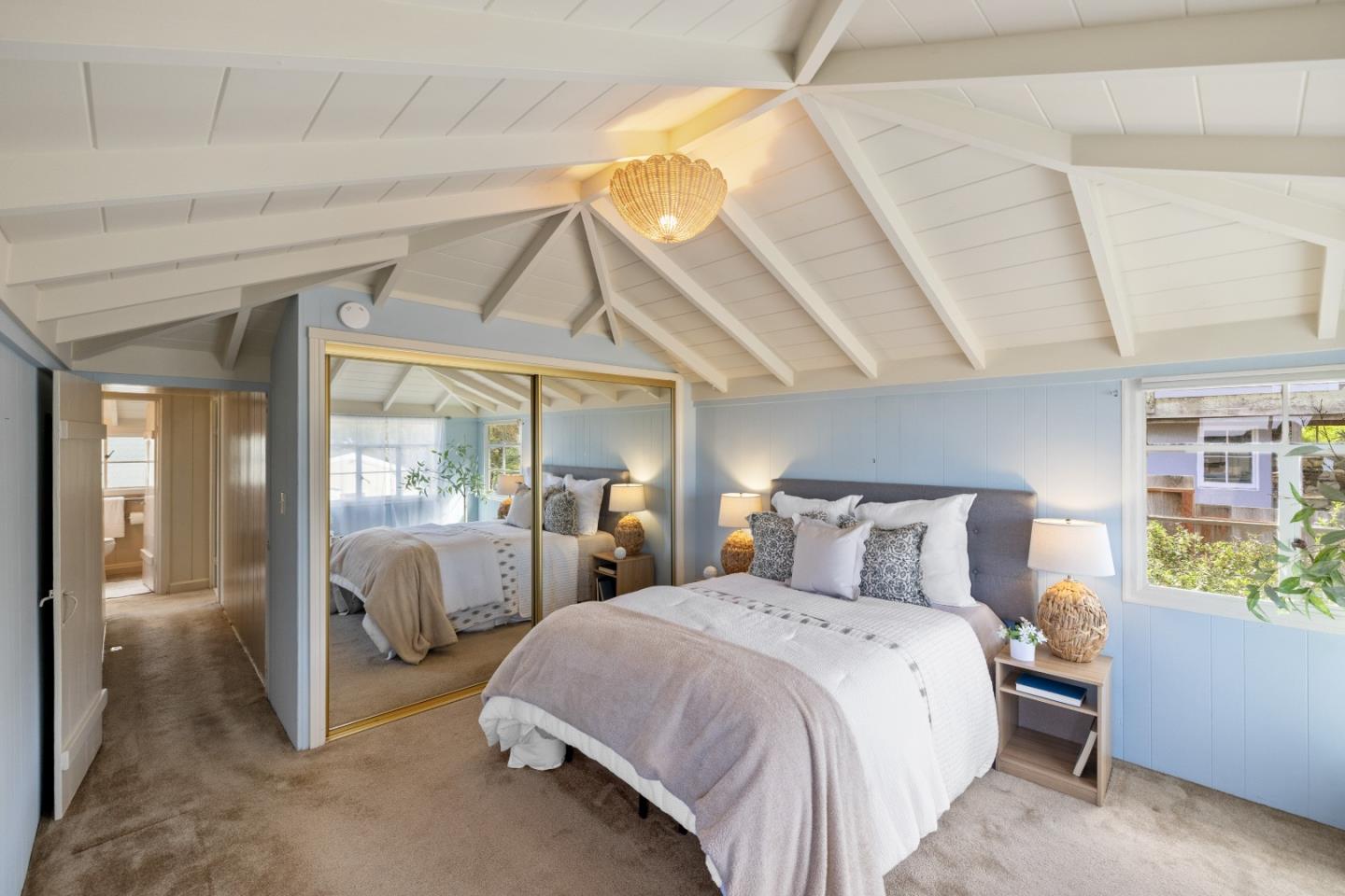 705 Grace Street Monterey, CA 93940 - Photo 20 of 28 a bedroom with a bed and large window