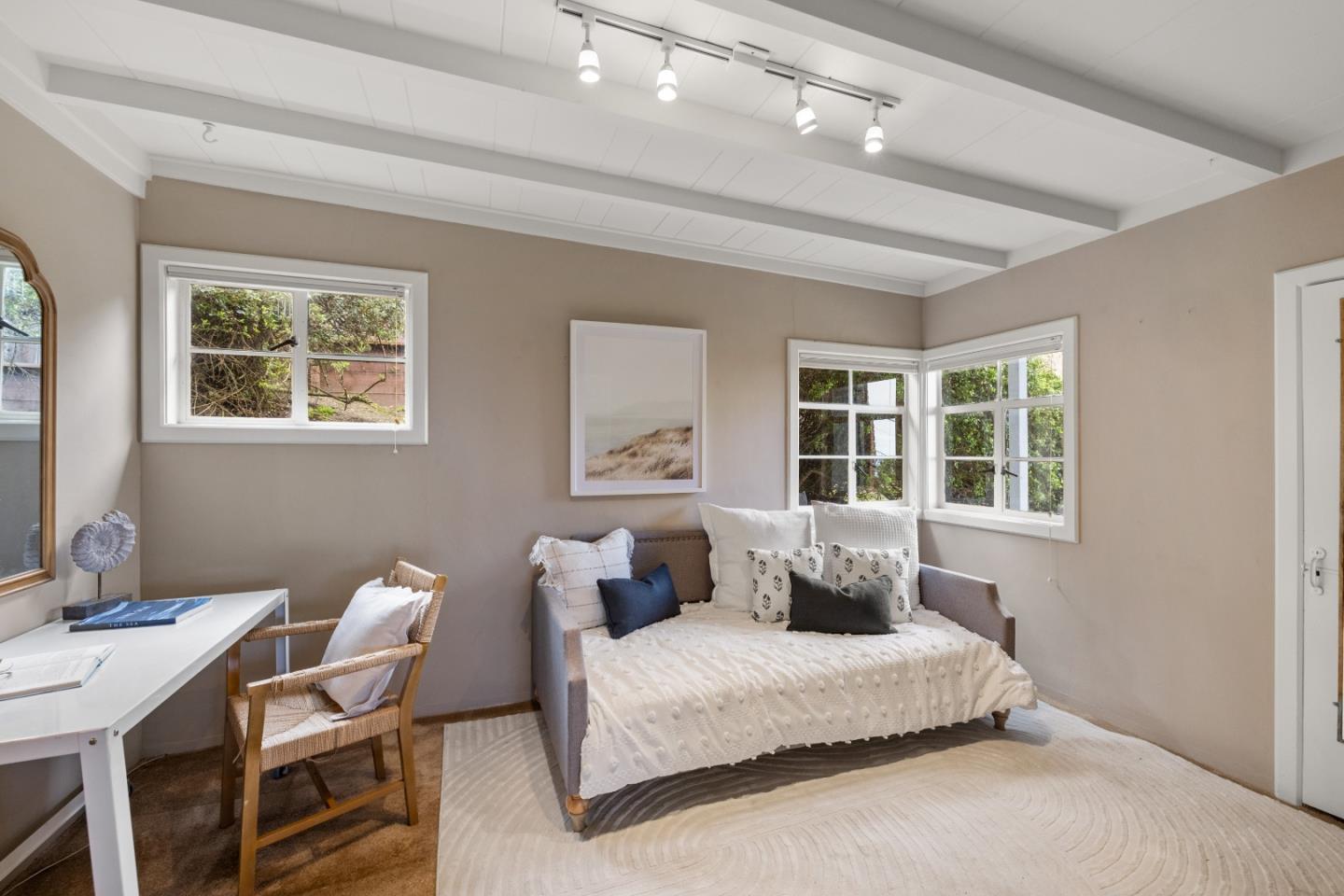 705 Grace Street Monterey, CA 93940 - Photo 8 of 28 a bedroom with a bed and wooden floor