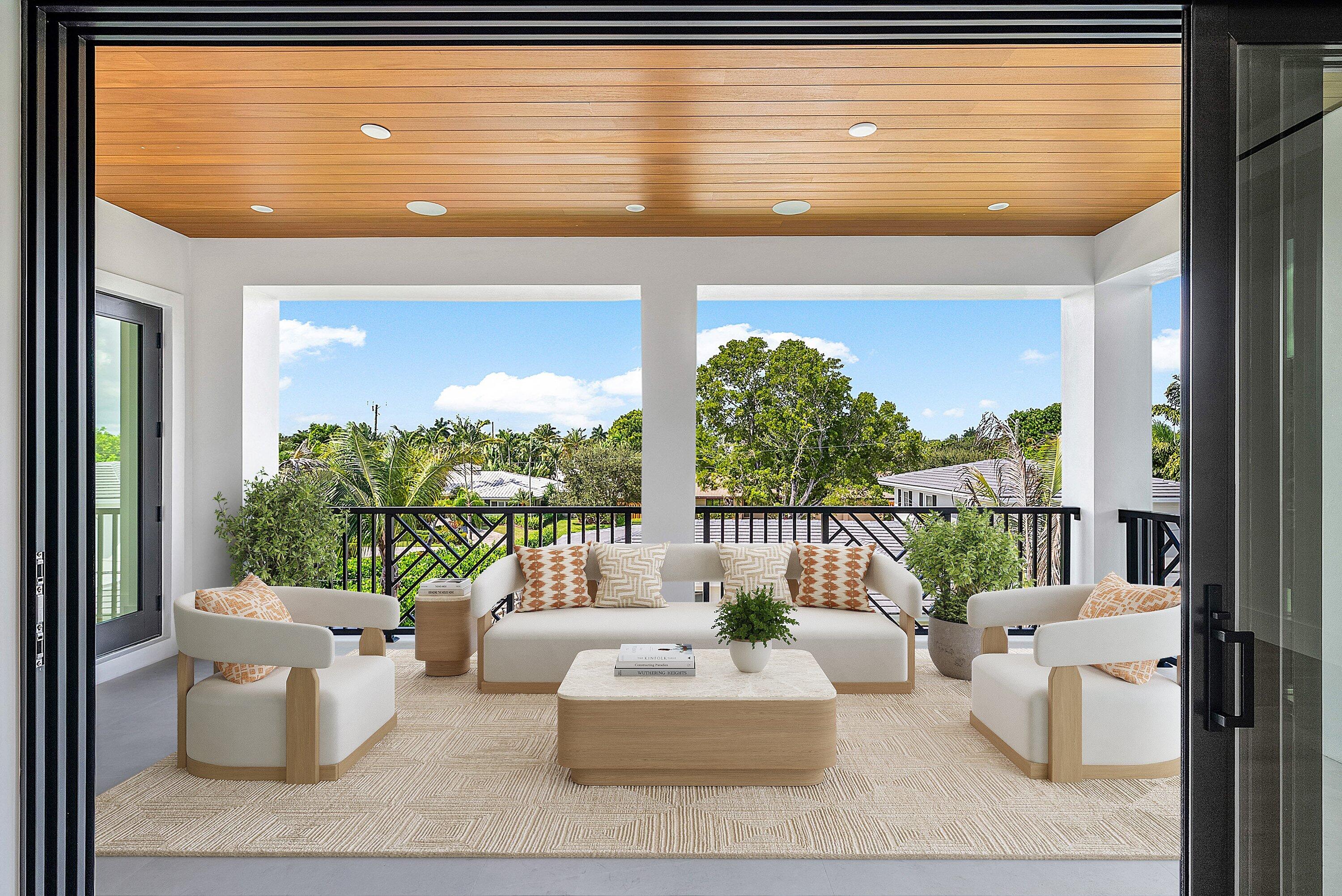 2609 Northeast 27th Way Fort Lauderdale, FL 33306 - Photo 40 of 53 a living room with patio furniture and a potted plant