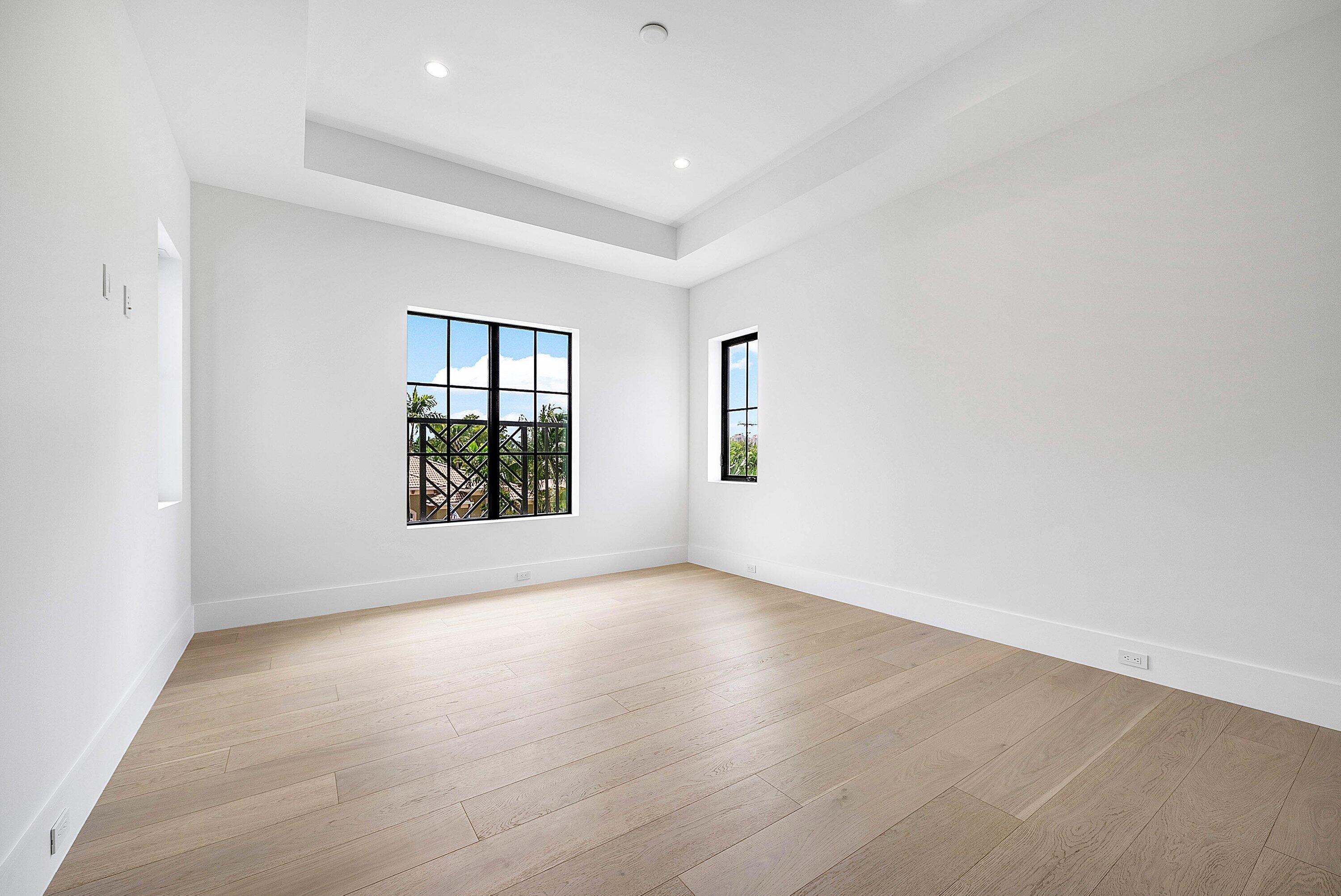2609 Northeast 27th Way Fort Lauderdale, FL 33306 - Photo 43 of 53 an empty room with windows