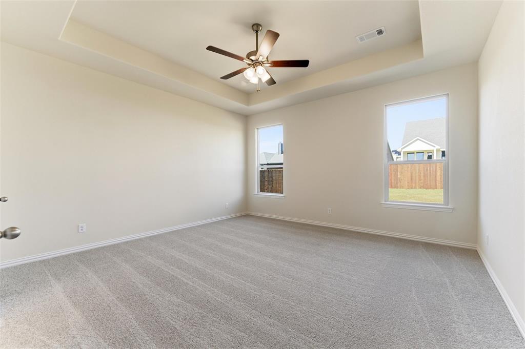 3513 Helena Street Gainesville, TX 76240 - Photo 15 of 25 wooden floor in an empty room with a window