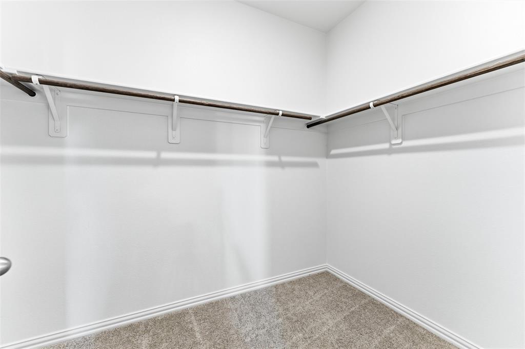 3513 Helena Street Gainesville, TX 76240 - Photo 17 of 25 a view of an empty walk in closet