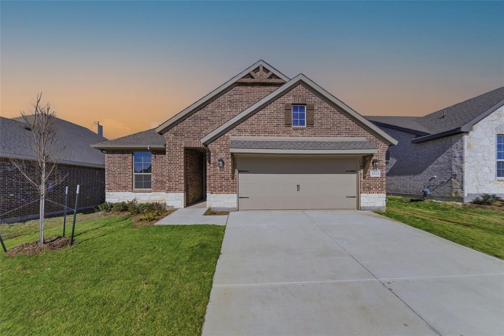 3513 Helena Street Gainesville, TX 76240 - Photo 25 of 25 a view of a house with a small yard and a large window