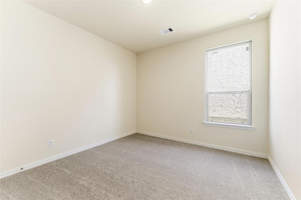 3513 Helena Street Gainesville, TX 76240 - Photo 10 of 25 an empty room with a window