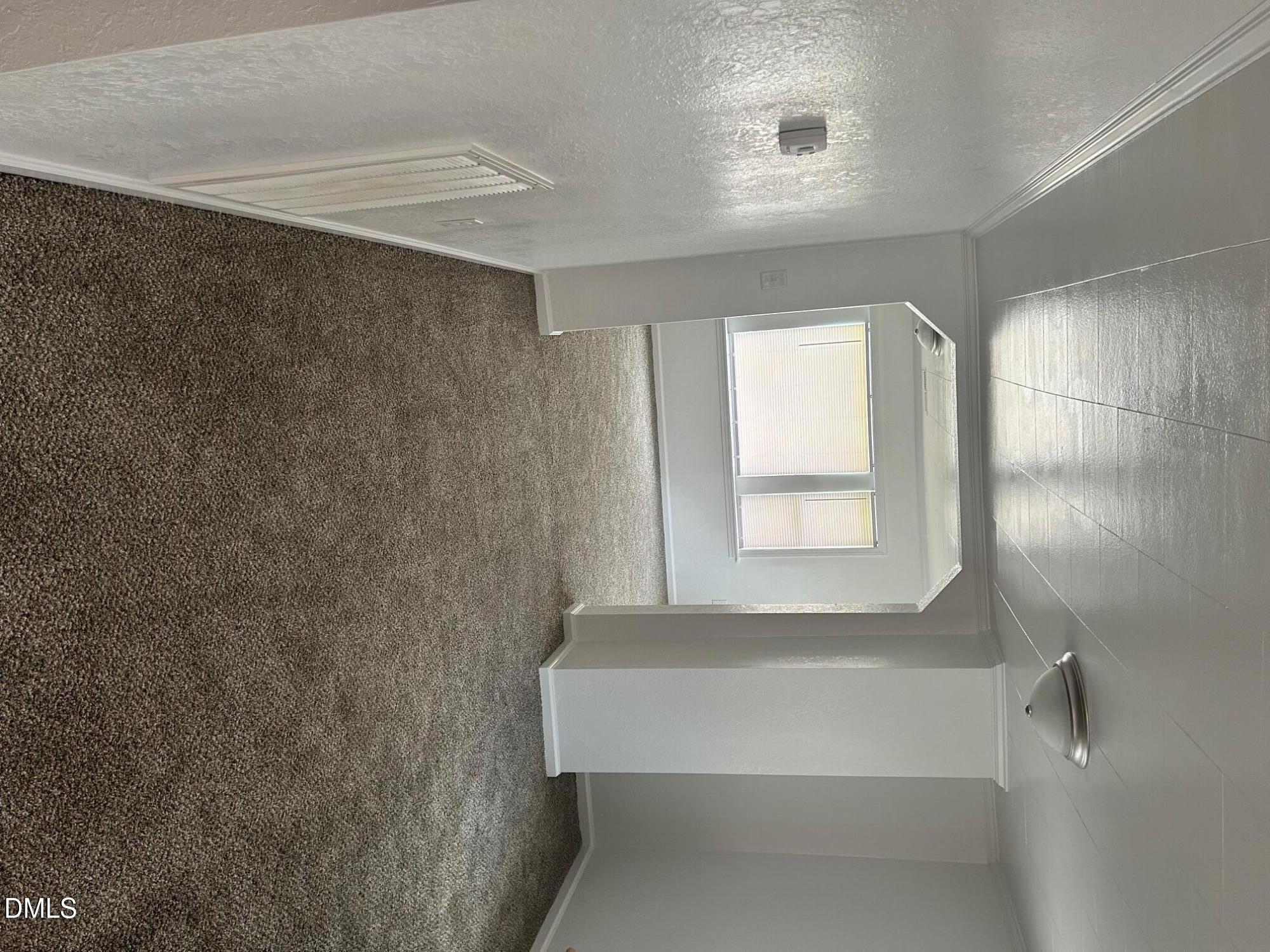 10841 Highway 32 Roper, NC 27970 - Photo 22 of 25 a bathroom with a bathtub and a window