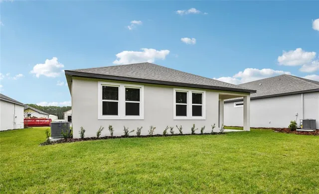 a front view of house with yard