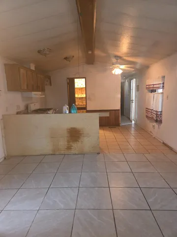 a view of a livingroom with a furniture