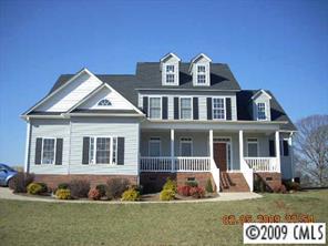 1159 Crossland Road Clover, SC 29710 - Photo 1 of 8 a front view of a house with a yard
