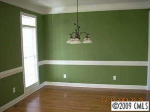 1159 Crossland Road Clover, SC 29710 - Photo 6 of 8 a view of a room with wooden floor and windows
