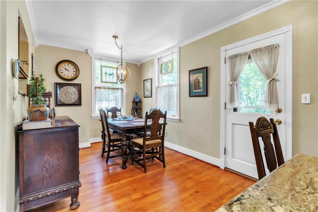 223 Belmont Road Butler, PA 16001 - Photo 19 of 50 a view of a dining room with furniture and a large window