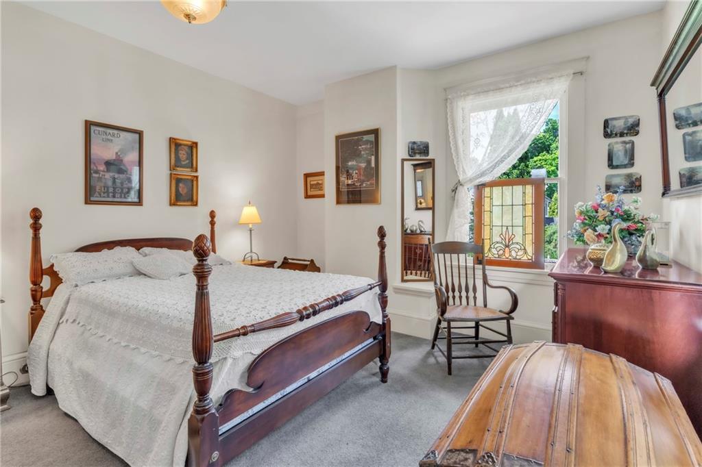 223 Belmont Road Butler, PA 16001 - Photo 37 of 50 a bed room with a bed and a chair
