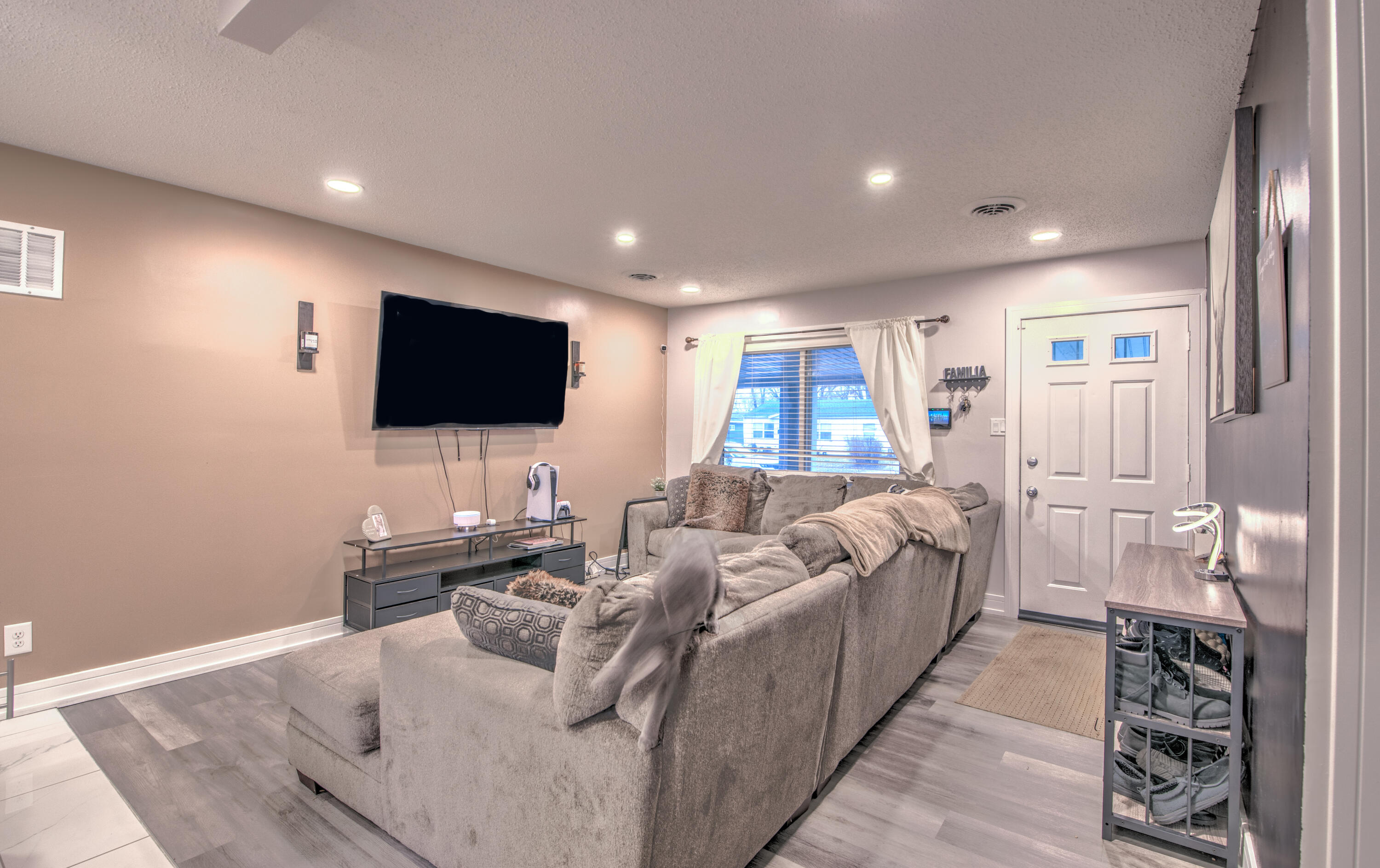 2080 Wright Street Gary, IN 46404 - Photo 5 of 20 a living room with furniture and a flat screen tv