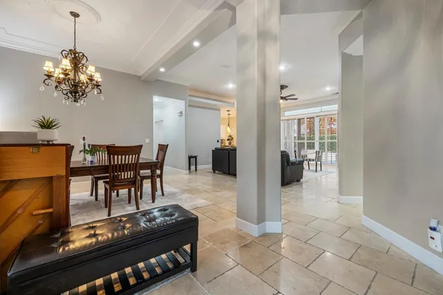 a kitchen with granite countertop a sink and cabinets
