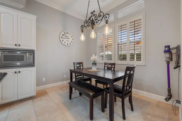 a bathroom with a sink a vanity and a mirror