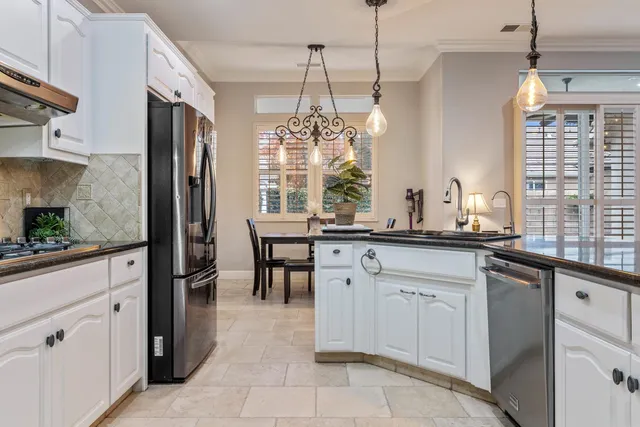 a view of a livingroom with furniture and a fireplace