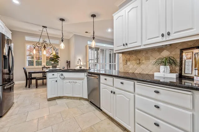a bathroom with a bathtub and a sink