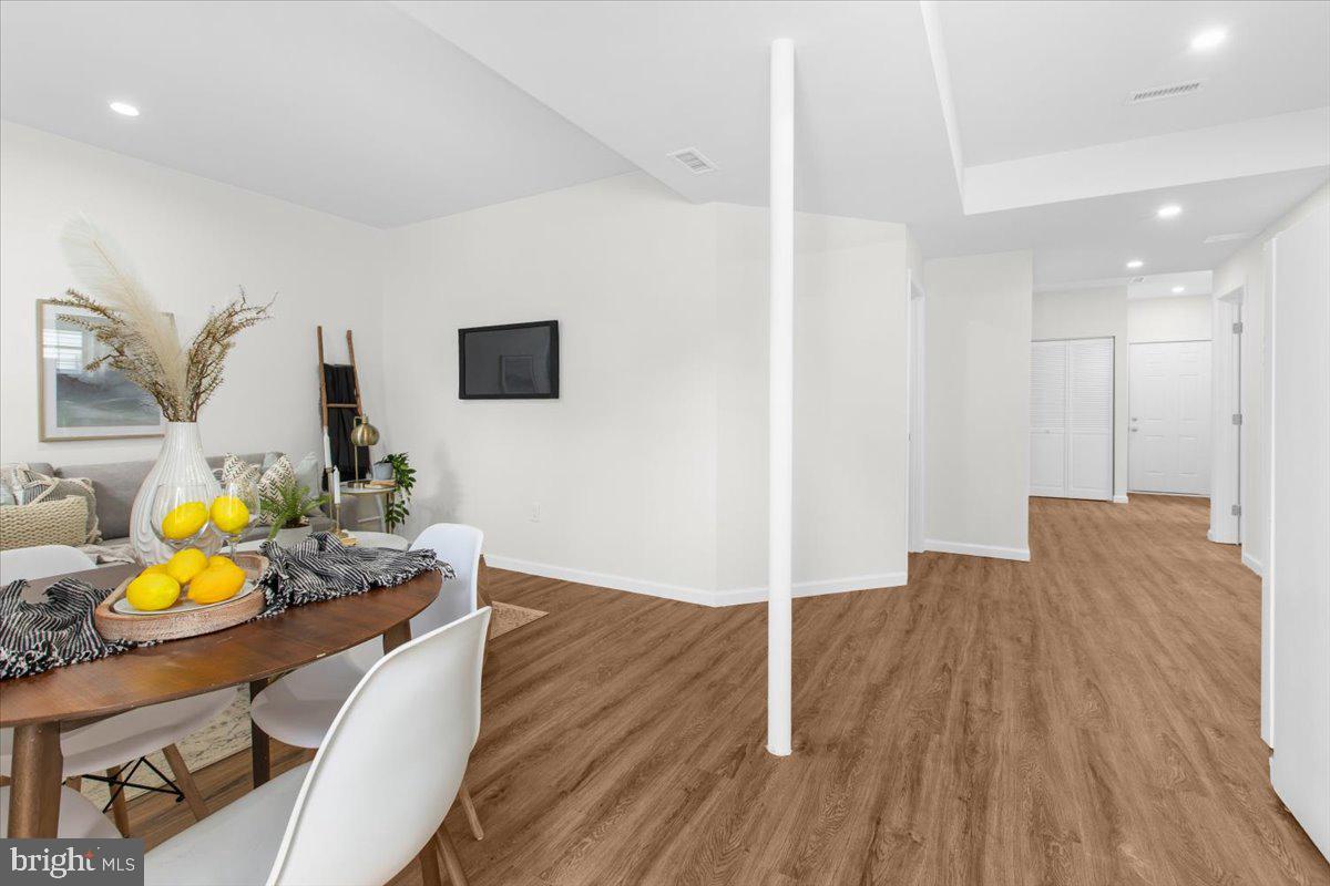 1224 Kendrick Road Rosedale, MD 21237 - Photo 35 of 44 Lower level dining area and hallway