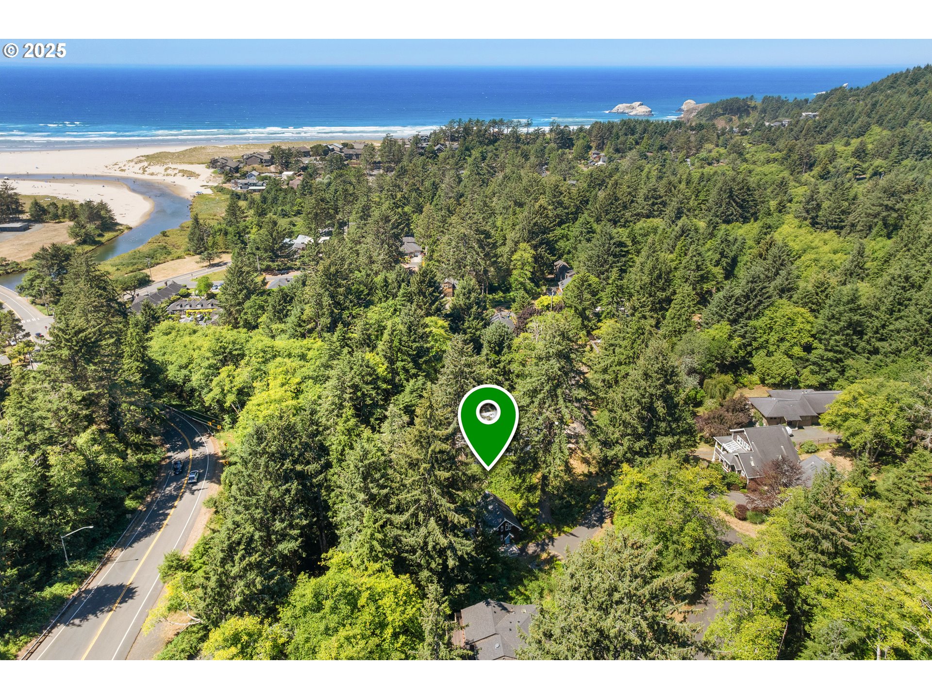 0 East 6th Street Cannon Beach, OR 97110 - Photo 13 of 15 a view of a city and an ocean