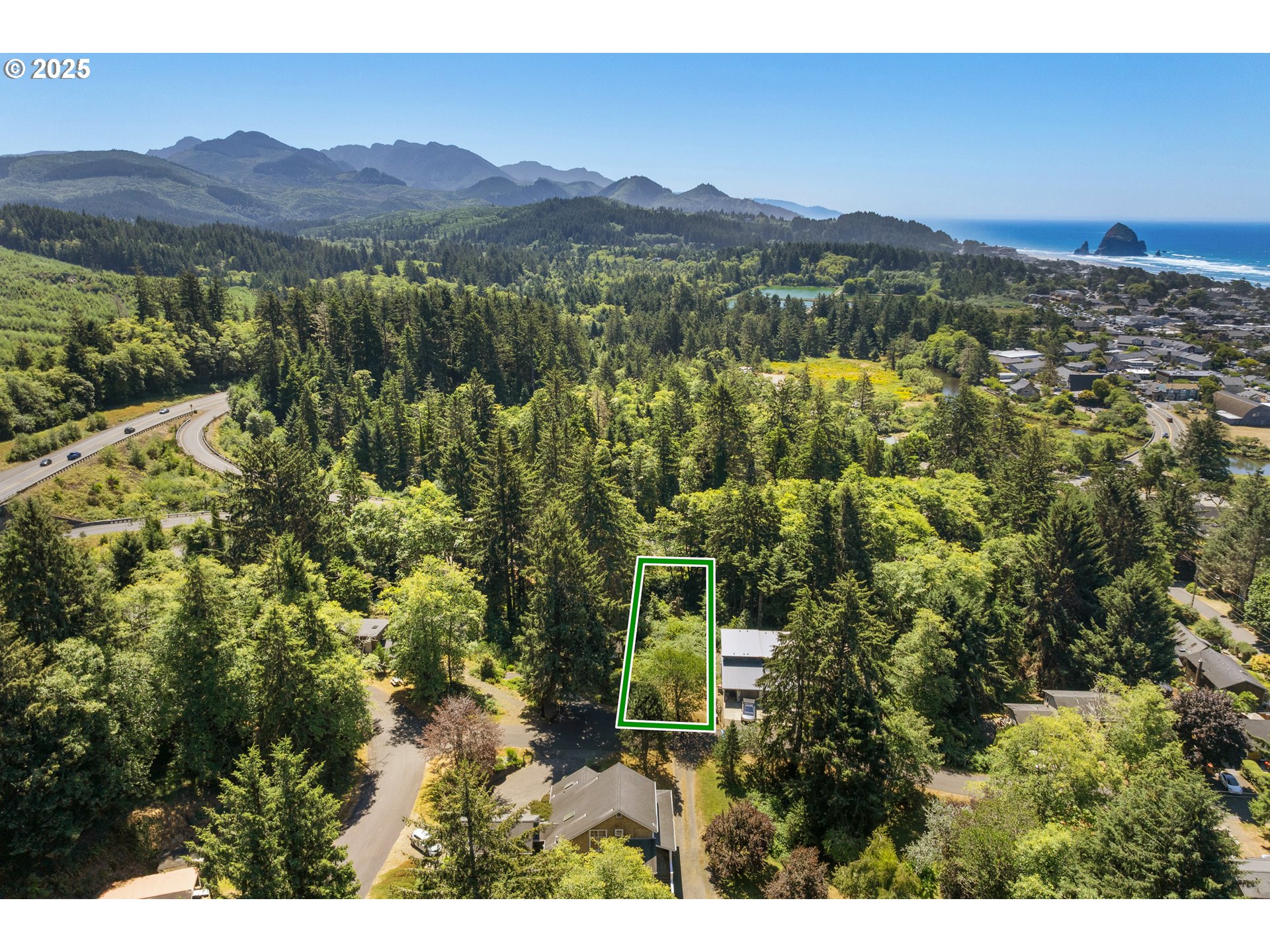 0 East 6th Street Cannon Beach, OR 97110 - Photo 14 of 15 a view of a city with a mountain