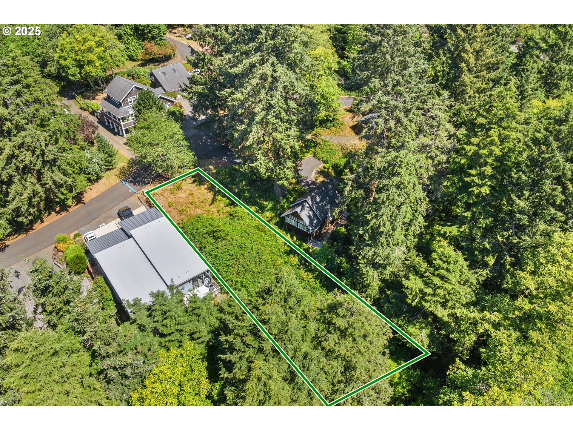 0 East 6th Street Cannon Beach, OR 97110 - Photo 6 of 15 a view of a yard