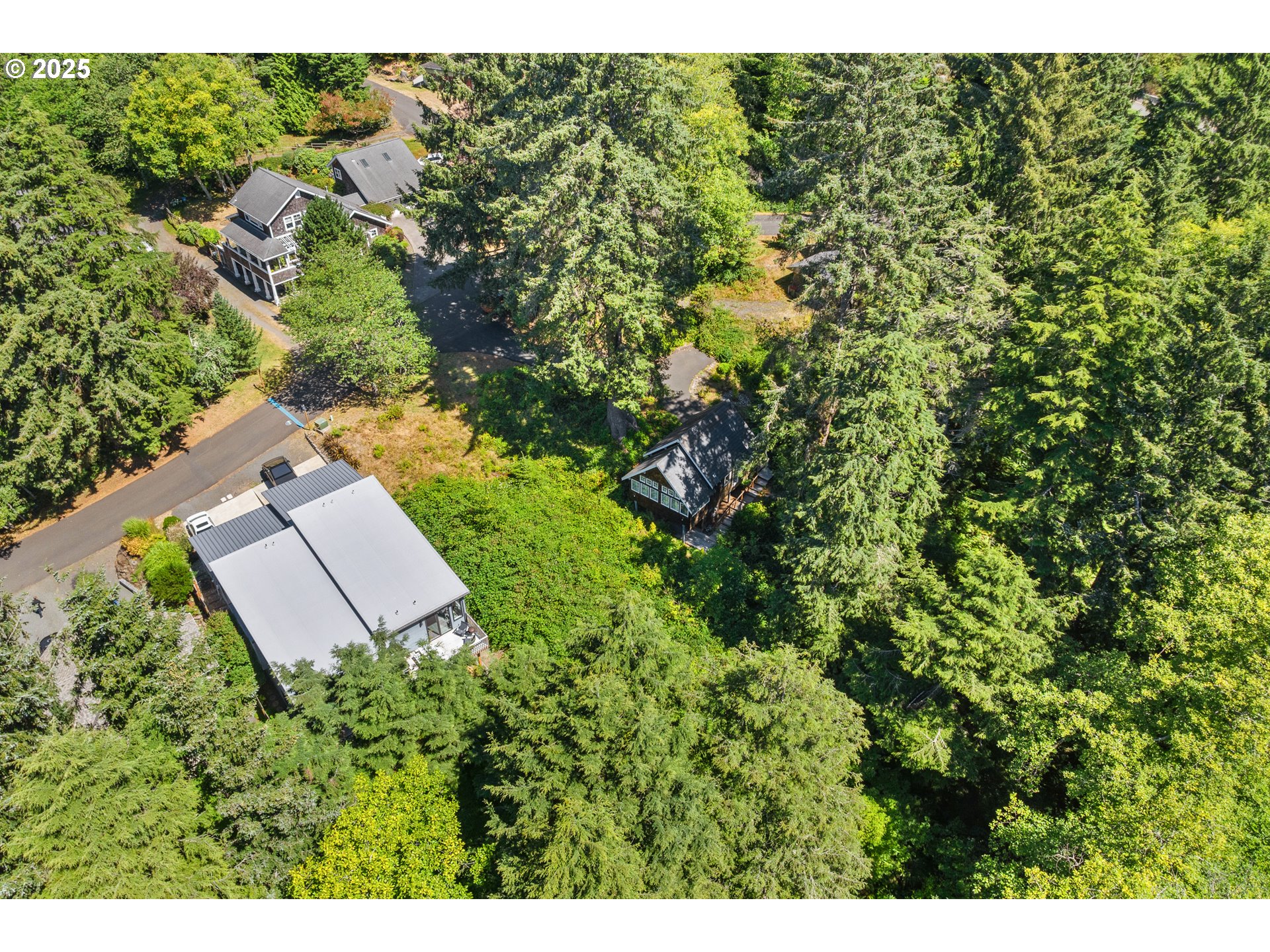 0 East 6th Street Cannon Beach, OR 97110 - Photo 7 of 15 a view of a yard