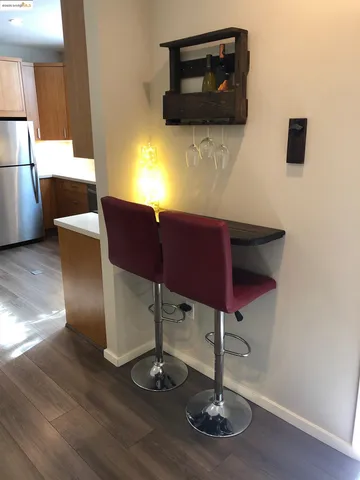 a room with furniture and wooden floor