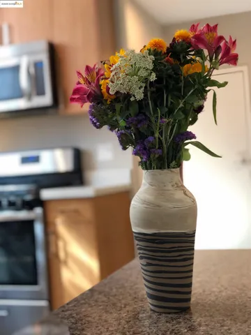 a vase of flowers sitting on a table