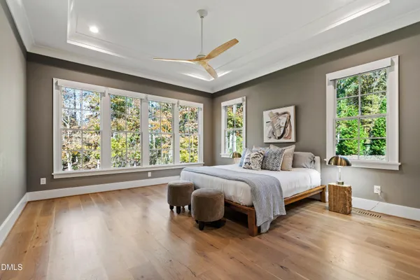 a view of room with cabinets and wooden floor