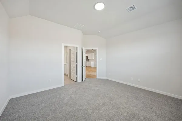 an empty room with a empty space and window