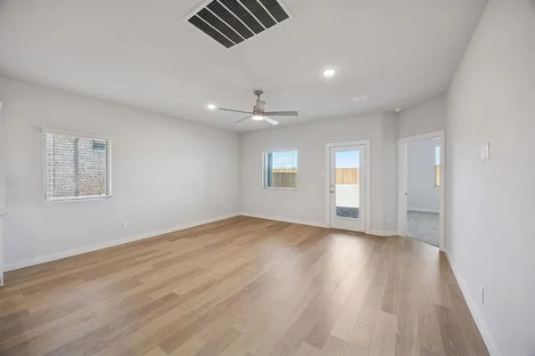 a kitchen with a sink and a stove top oven