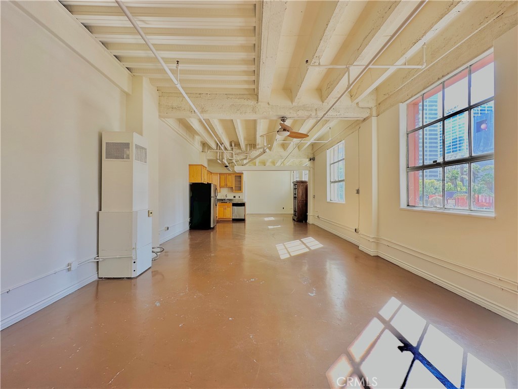 312 West 5th Street, Unit M1 Los Angeles, CA 90013 - Photo 3 of 8 a view of a room with lots of windows