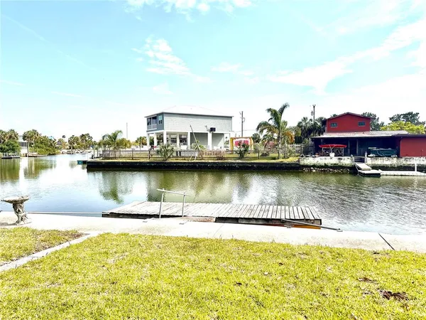 a view of a lake with houses