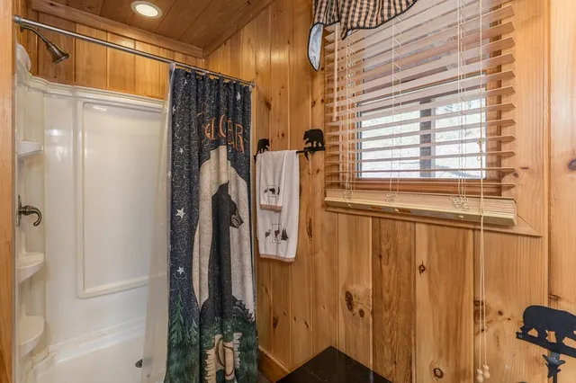 a view of a balcony with chairs