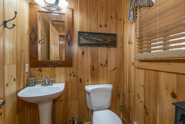 a outdoor living space with furniture and a fireplace