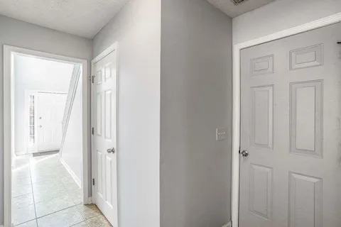 a view of a bathroom from the hallway